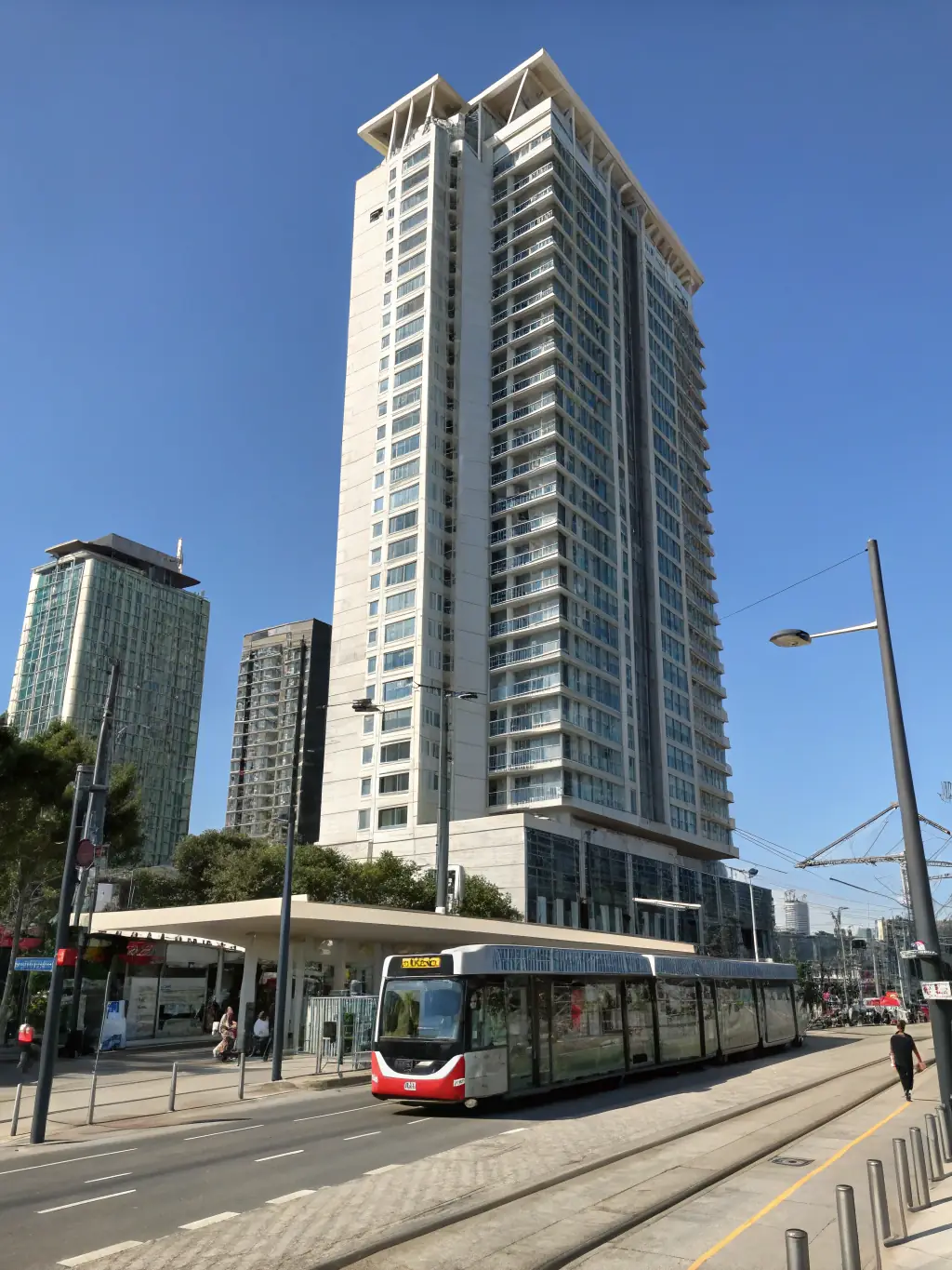 A luxury apartment building with a modern design, representing Armages LLC's real estate solutions.